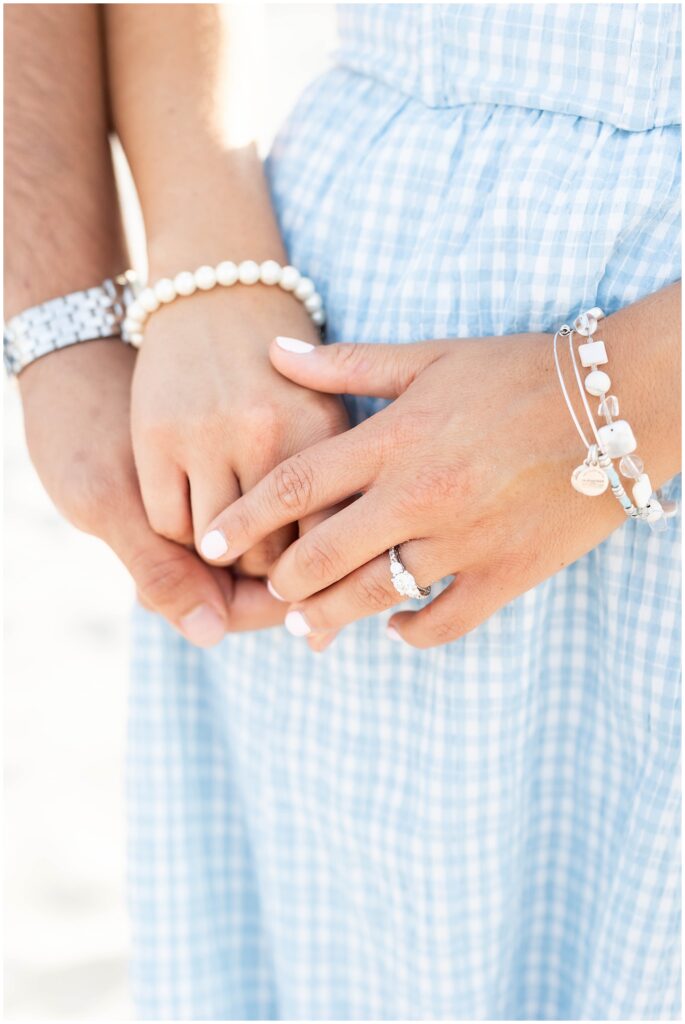 Engaged couple enjoying the nostalgic charm of the Ocean City NJ boardwalk