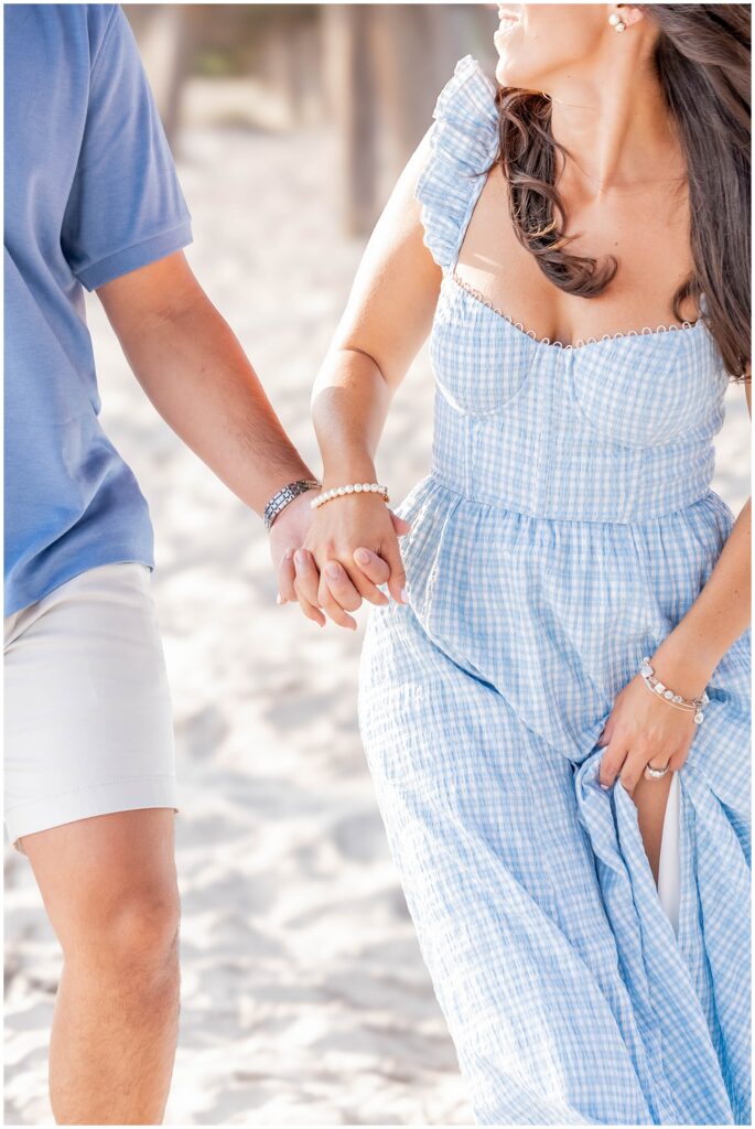 Romantic couple exploring Ocean City New Jersey before sunset