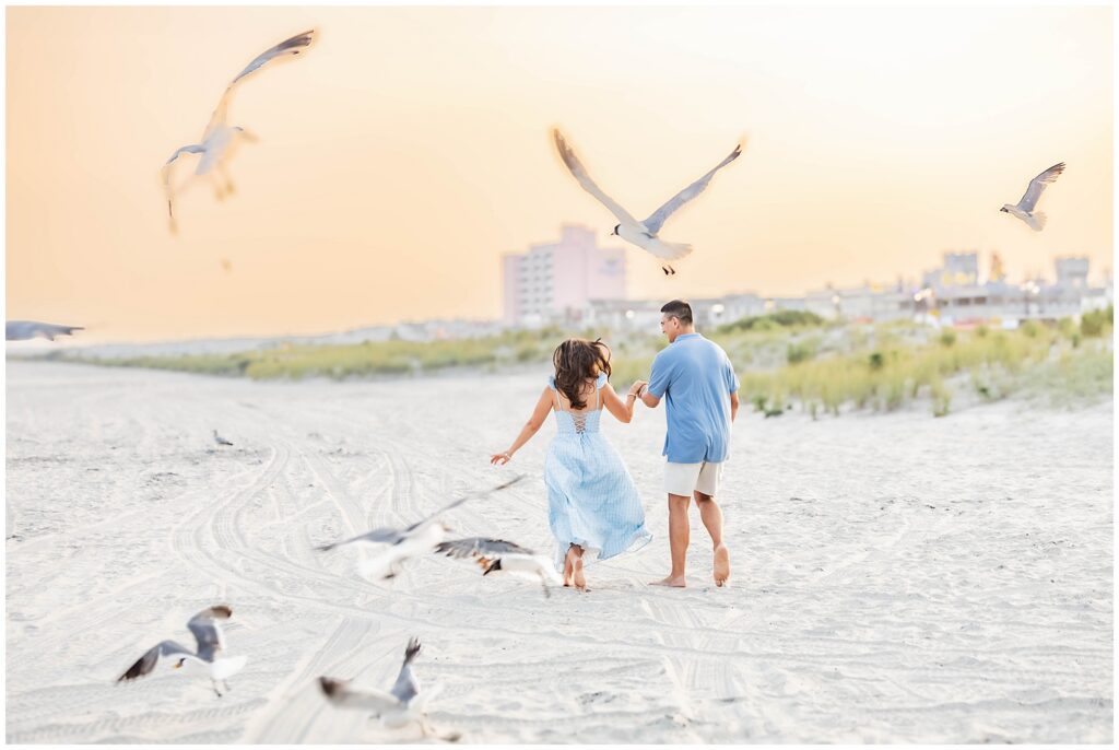 Sunset engagement portraits on the beach in Ocean City New Jersey