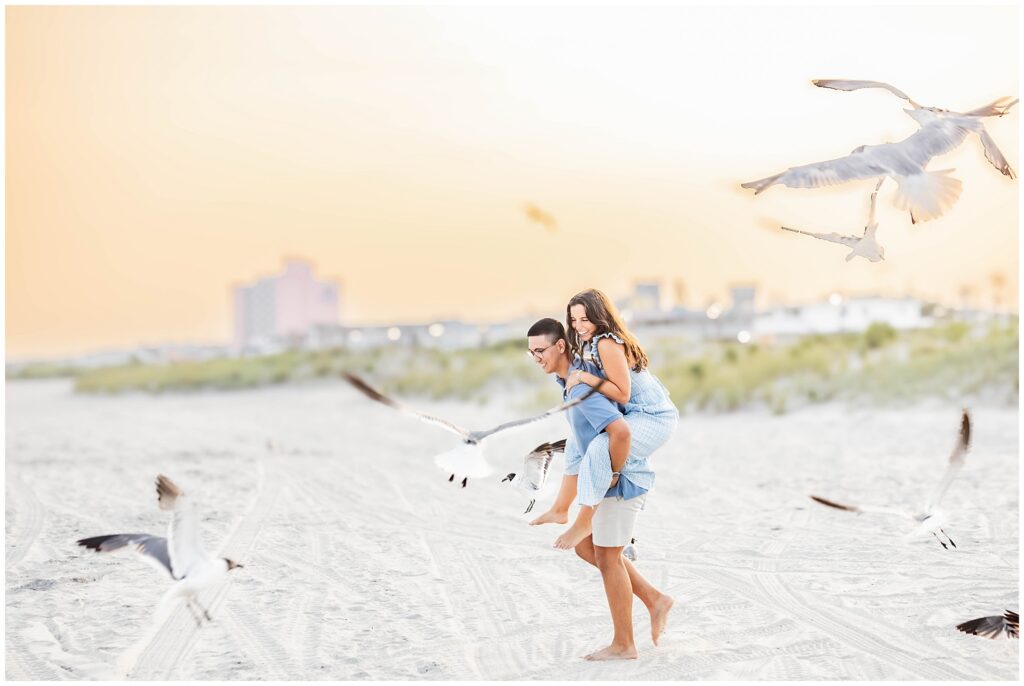 Romantic beach engagement portraits at sunset in Ocean City NJ
